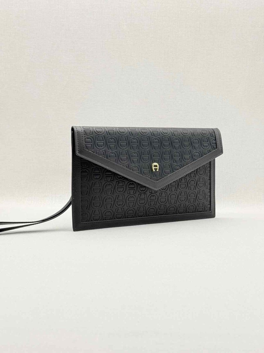 Pre - loved AIGNER Envelope Black Wristlet at Reems Closet