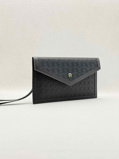 Pre - loved AIGNER Envelope Black Wristlet at Reems Closet