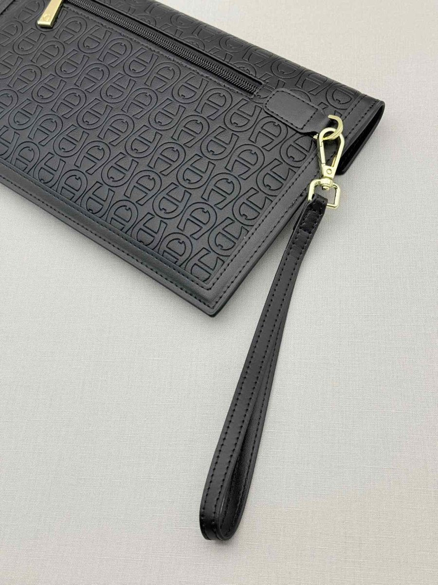 Pre - loved AIGNER Envelope Black Wristlet at Reems Closet