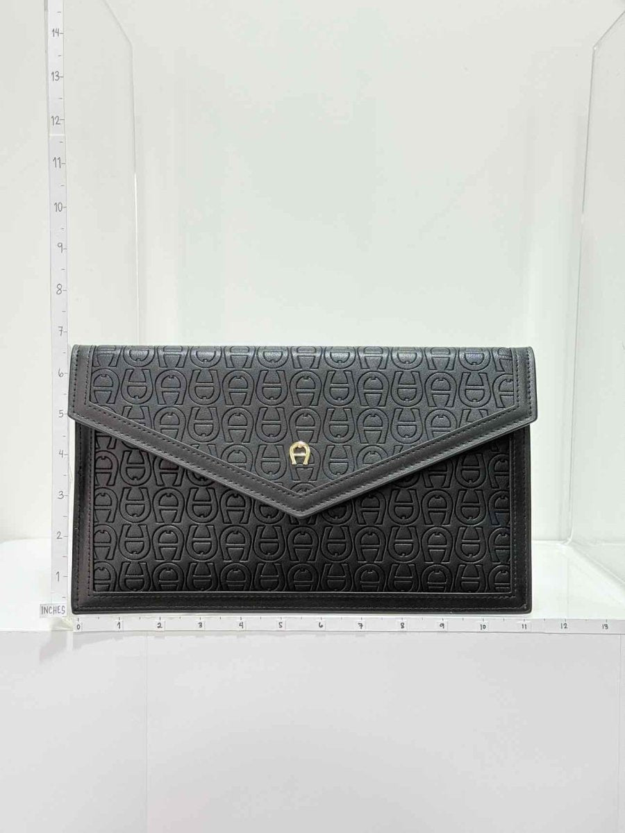 Pre - loved AIGNER Envelope Black Wristlet at Reems Closet