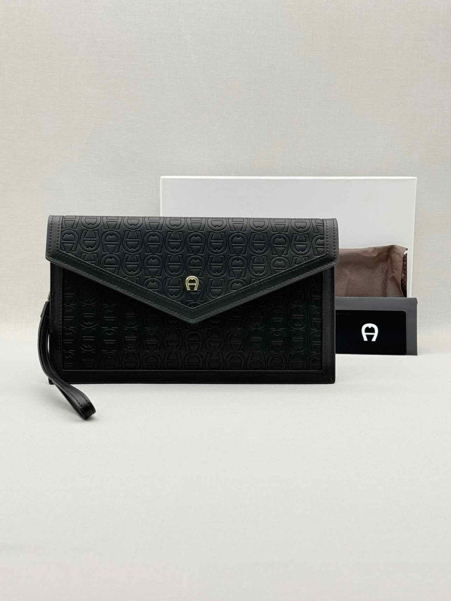 Pre - loved AIGNER Envelope Black Wristlet at Reems Closet