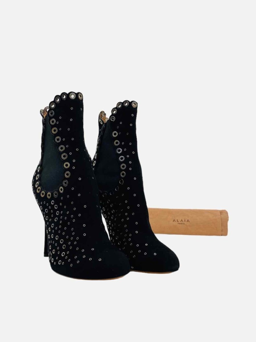 Pre - loved ALAIA Black Grommet Embellished Ankle Boots at Reems Closet