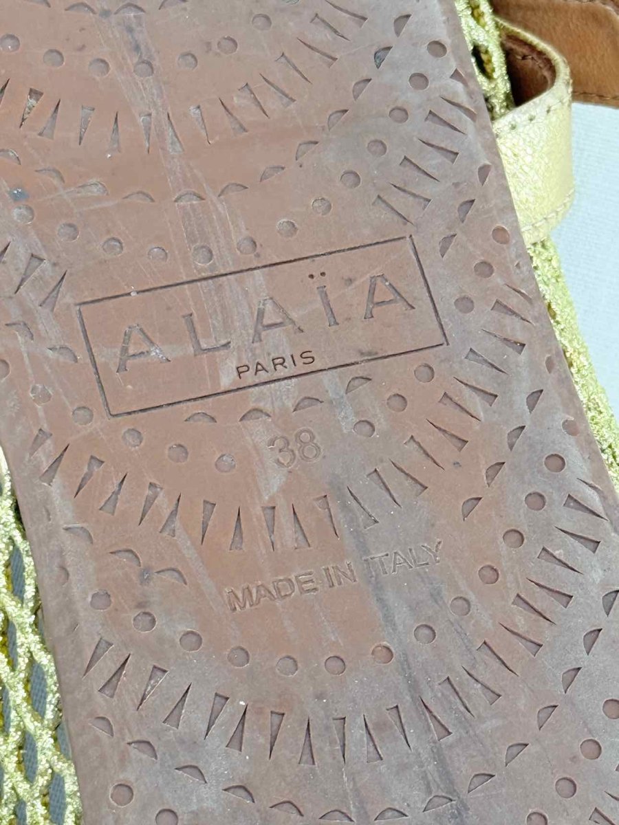 Pre - loved ALAIA Fishnet Gold Size EU 38 Ballet Flats at Reems Closet