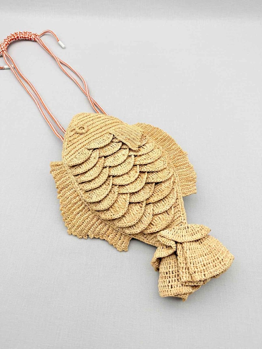Pre - loved ALEMAIS Horizon Fish Beige Clutch at Reems Closet
