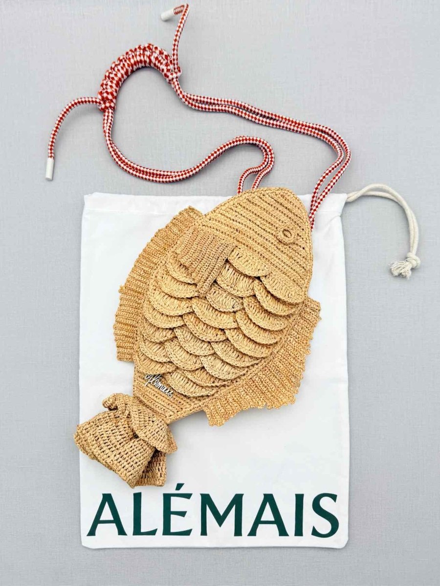 Pre - loved ALEMAIS Horizon Fish Beige Clutch at Reems Closet