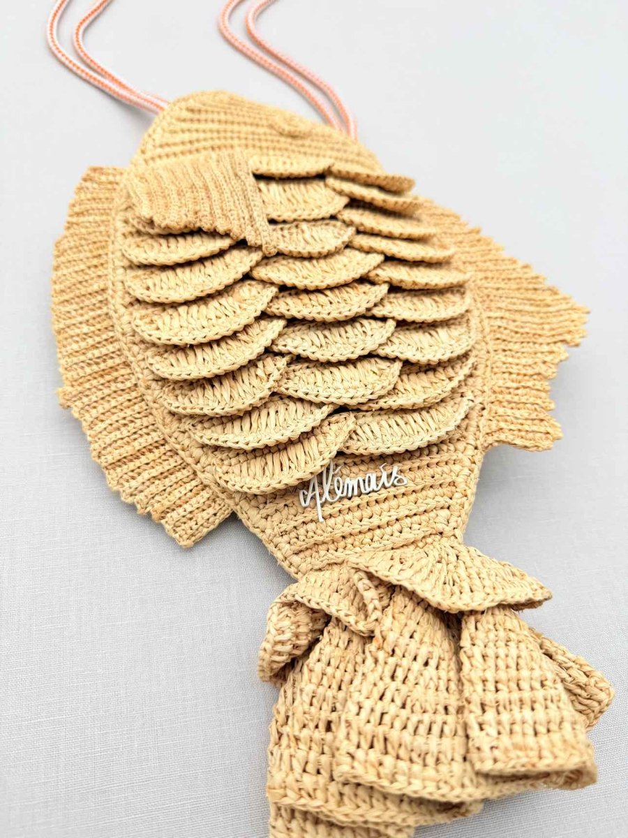 Pre - loved ALEMAIS Horizon Fish Beige Clutch at Reems Closet