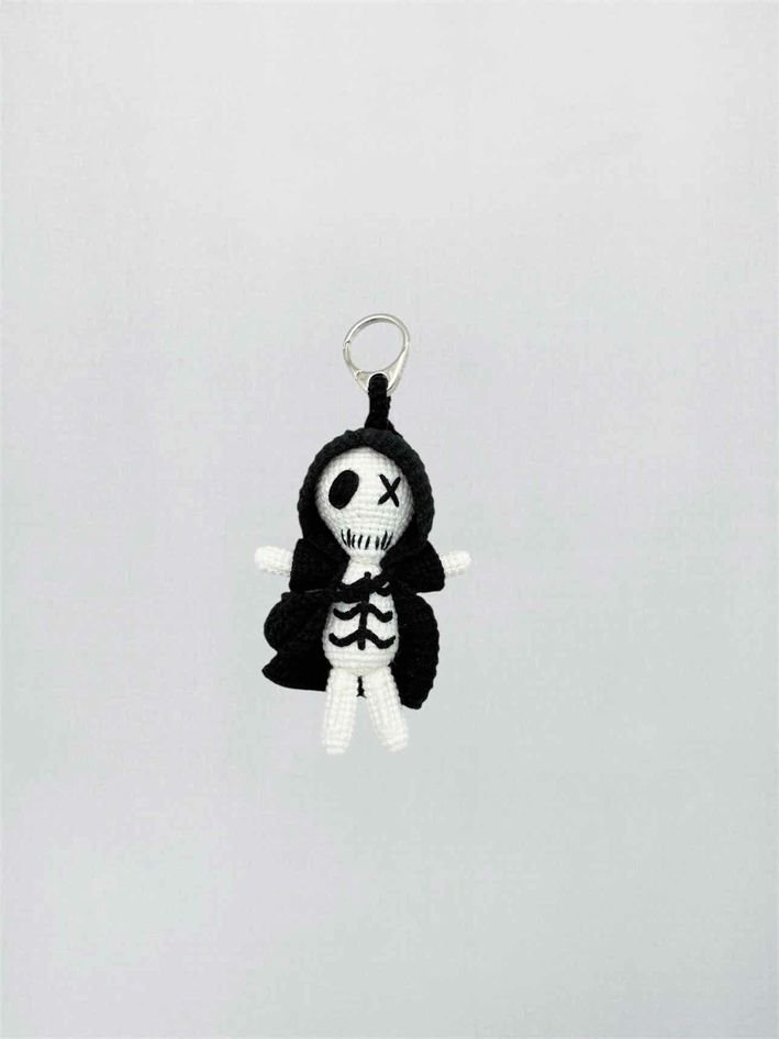 Pre-loved ALEXANDER MCQUEEN Black & White Key Chain at Reems Closet