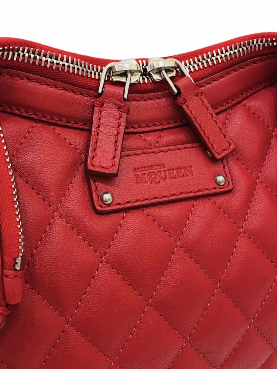 Pre - loved ALEXANDER MCQUEEN De Manta Red Quilted Clutch at Reems Closet