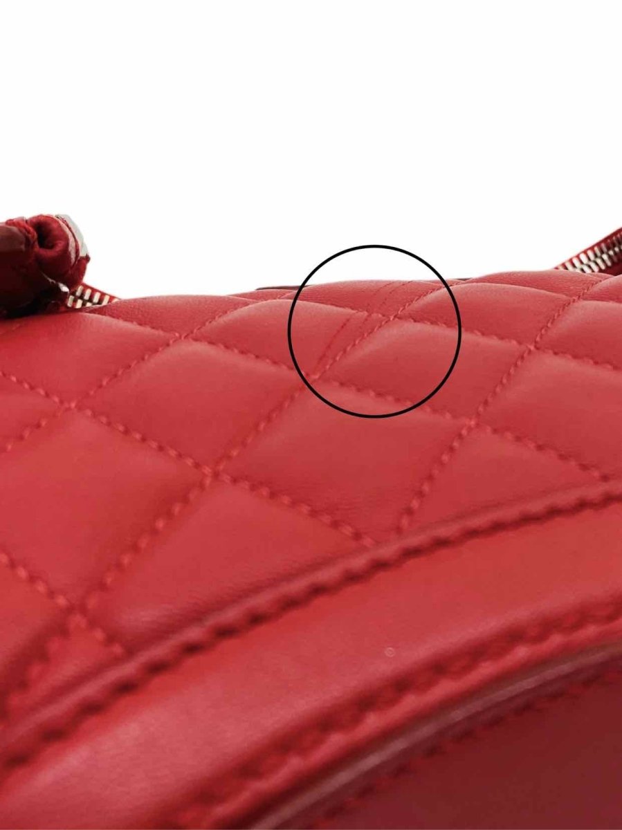 Pre - loved ALEXANDER MCQUEEN De Manta Red Quilted Clutch at Reems Closet