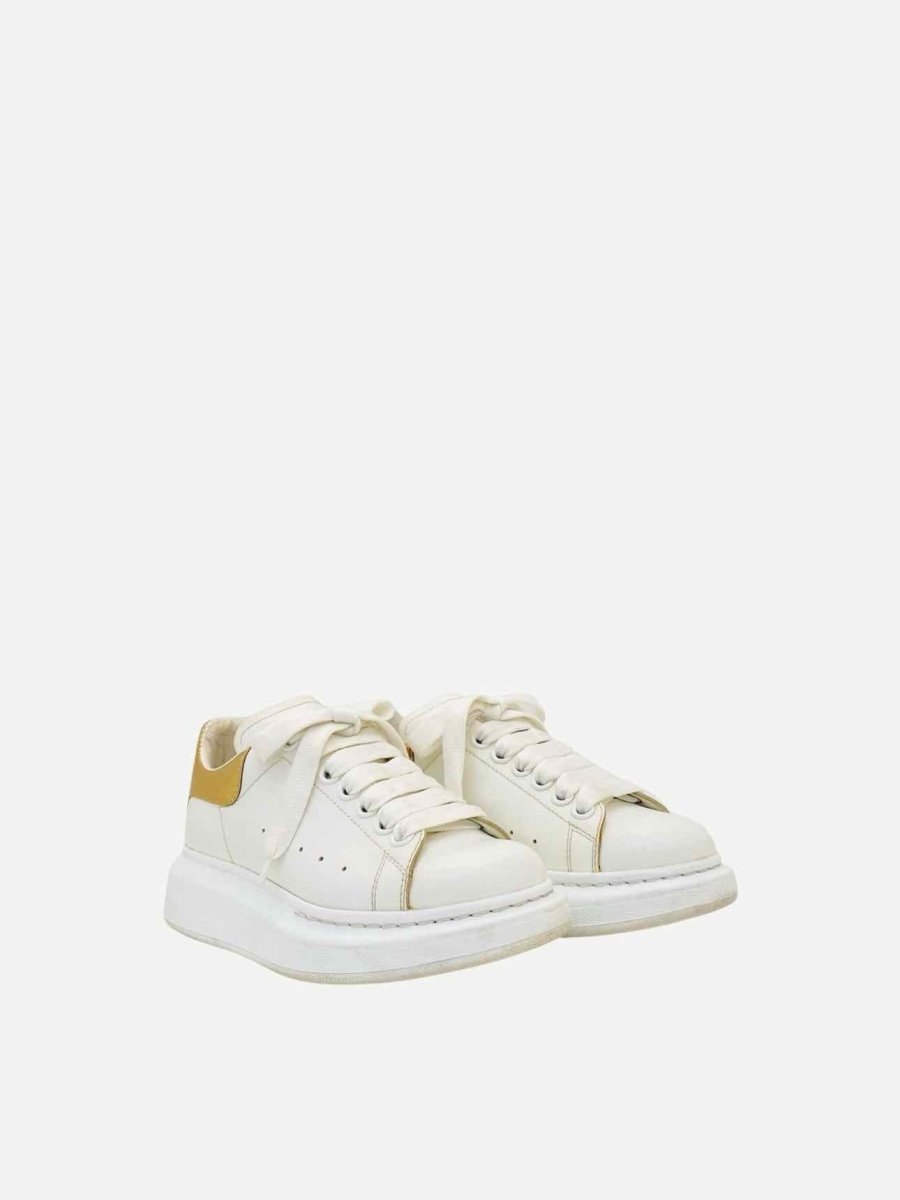 Pre-loved ALEXANDER MCQUEEN Oversized White & Gold Sneakers from Reems Closet