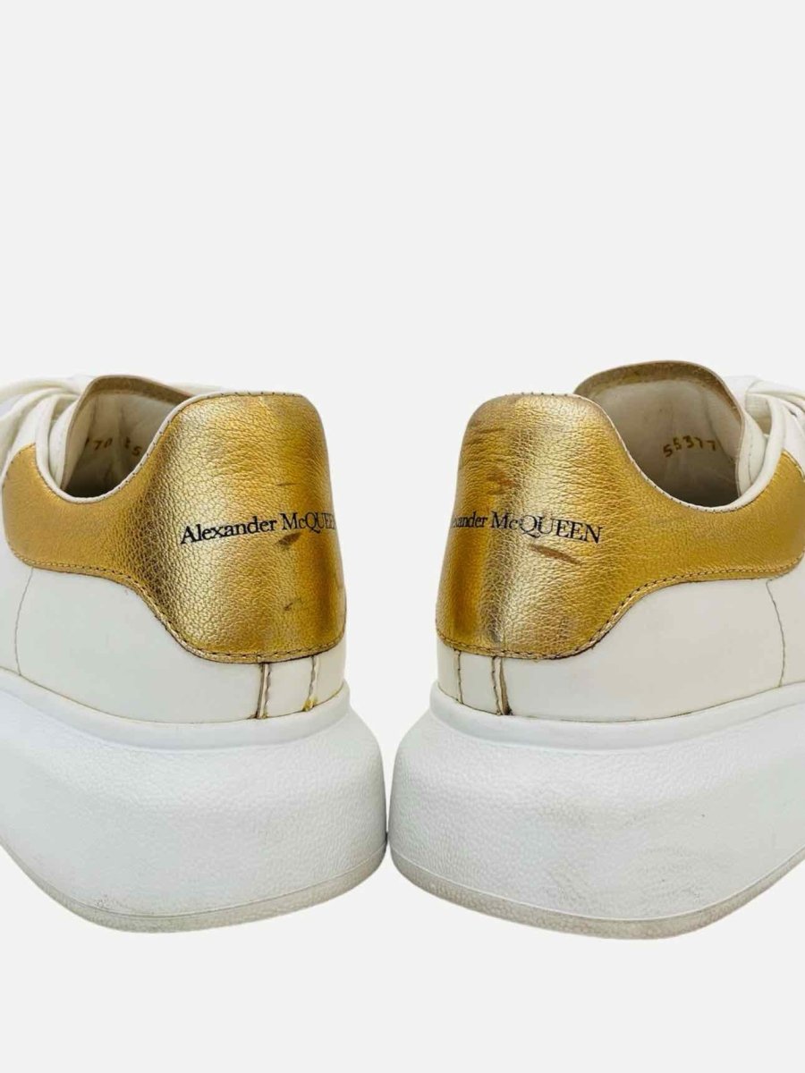 Pre-loved ALEXANDER MCQUEEN Oversized White & Gold Sneakers from Reems Closet