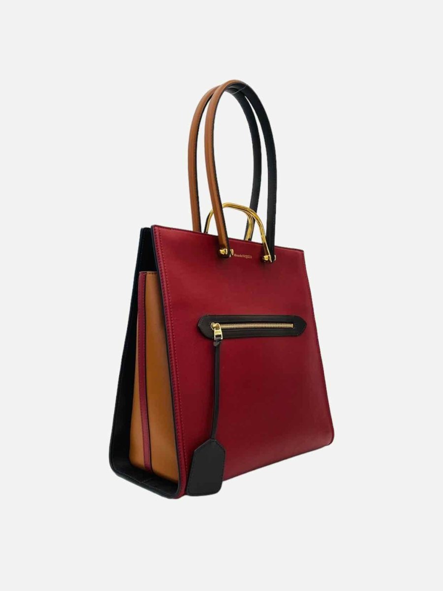 Pre-loved ALEXANDER MCQUEEN Toy Story Red & Black Top Handle at Reems Closet