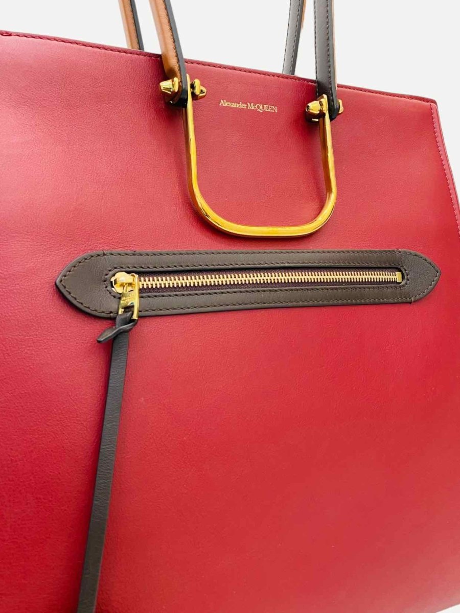 Pre-loved ALEXANDER MCQUEEN Toy Story Red & Black Top Handle at Reems Closet