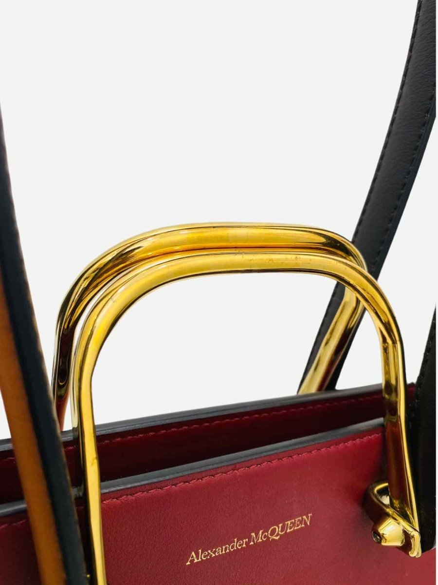 Pre-loved ALEXANDER MCQUEEN Toy Story Red & Black Top Handle at Reems Closet