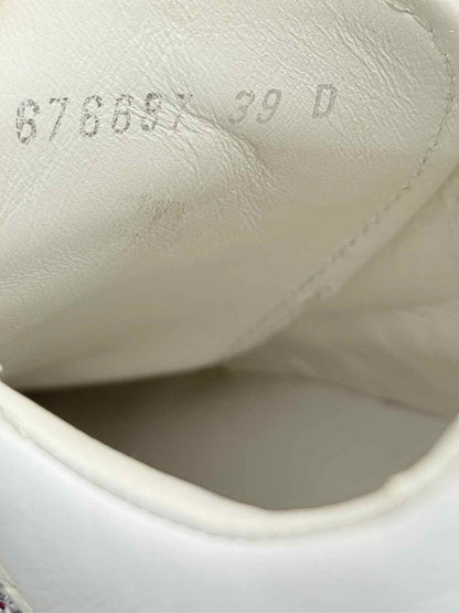 Pre-loved ALEXANDER MCQUEEN White & Silver Size EU 39 Sneakers at Reems Closet