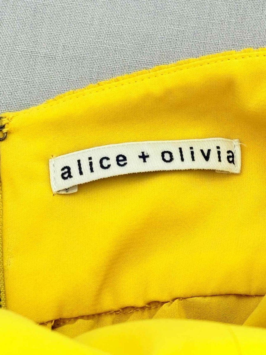 Pre - loved ALICE + OLIVIA Yellow Size Small Long Dress at Reems Closet