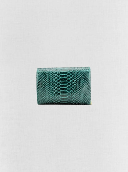 Pre - loved AMANDA NAVAI Green Embossed Handbag at Reems Closet