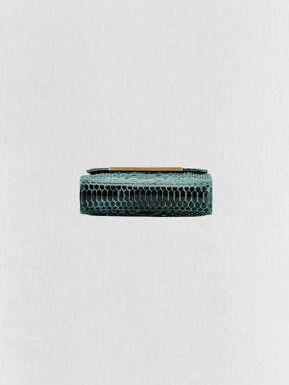 Pre - loved AMANDA NAVAI Green Embossed Handbag at Reems Closet