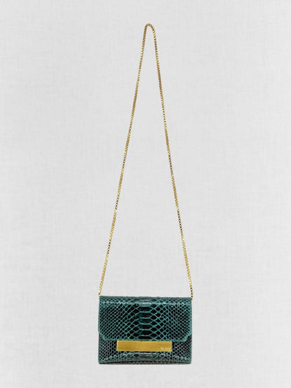 Pre - loved AMANDA NAVAI Green Embossed Handbag at Reems Closet