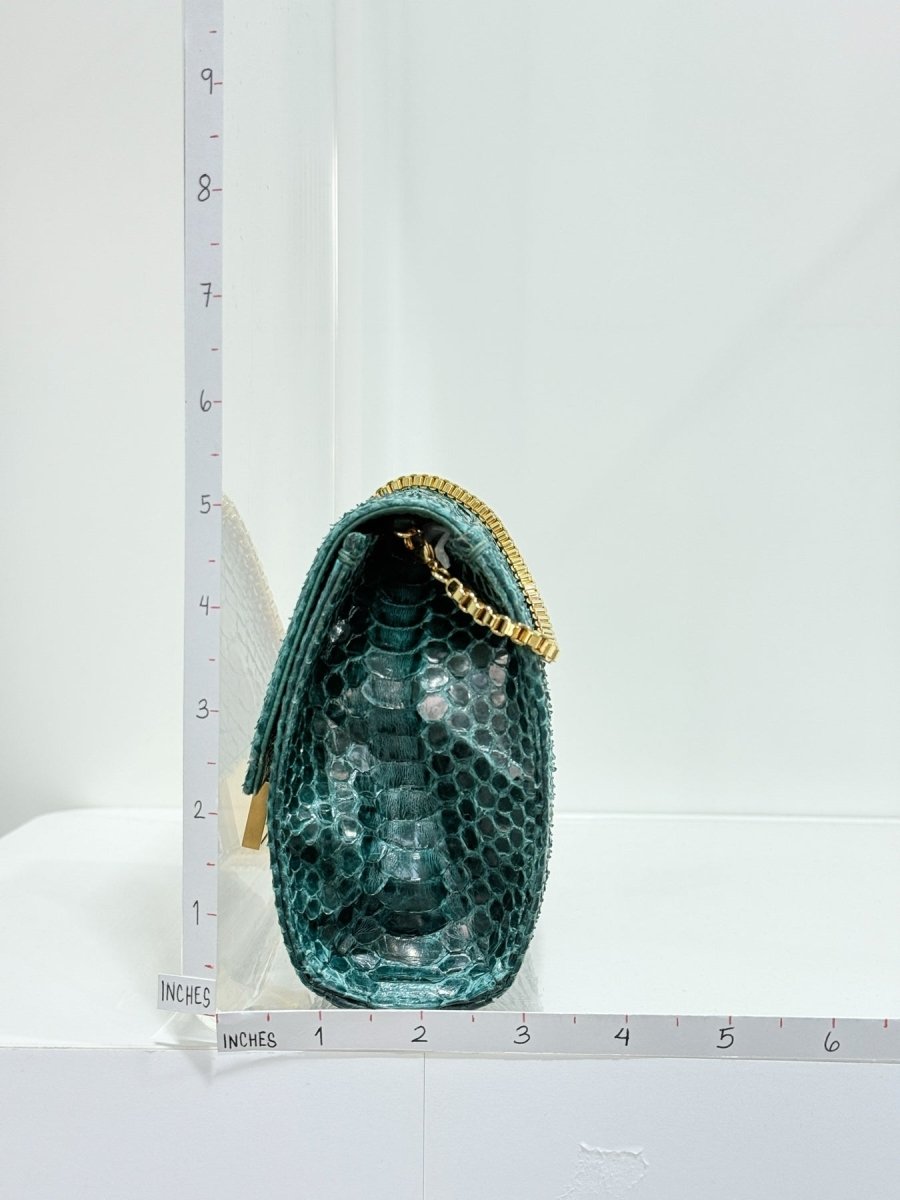 Pre - loved AMANDA NAVAI Green Embossed Handbag at Reems Closet