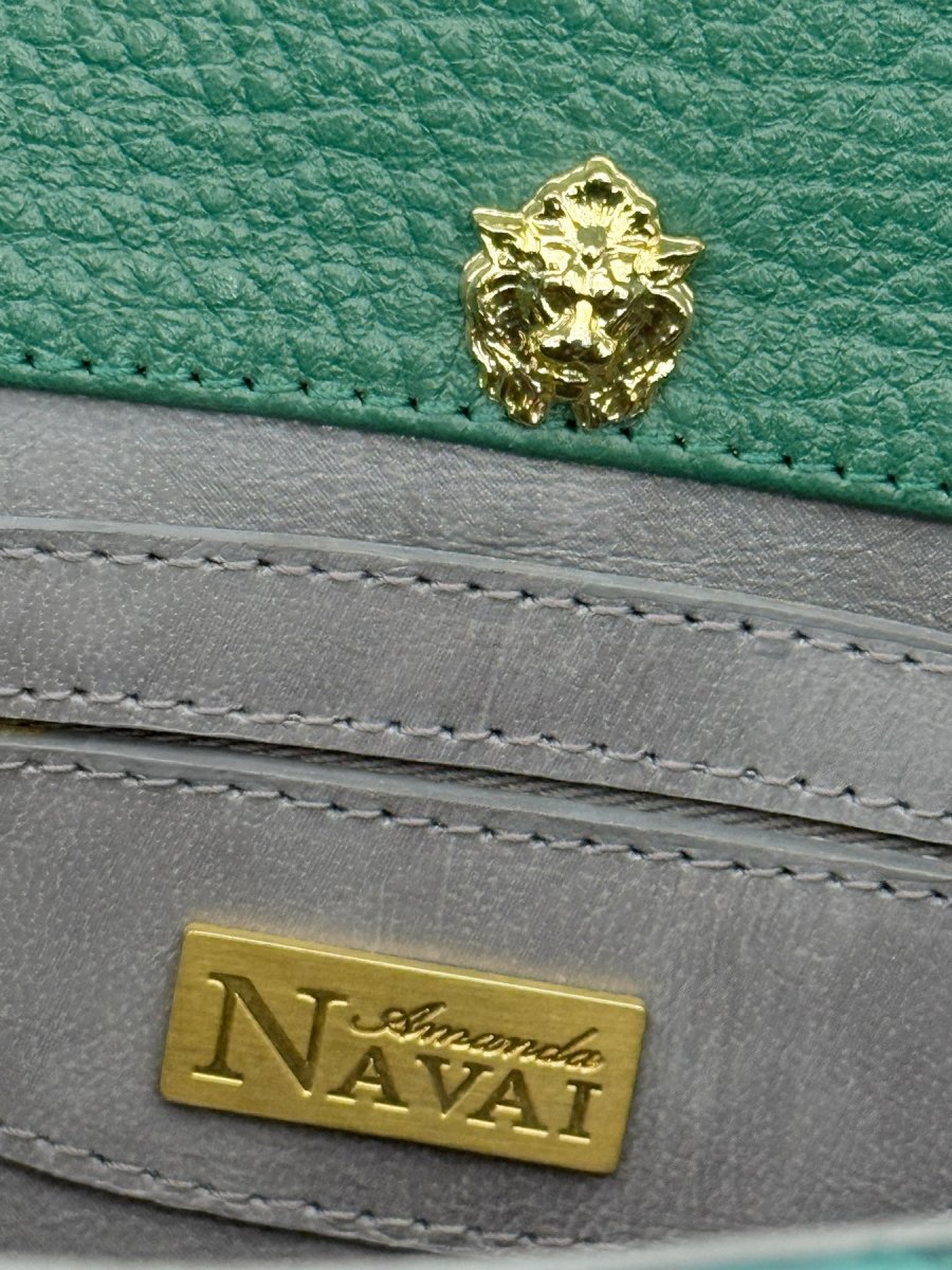 Pre - loved AMANDA NAVAI Green Embossed Handbag at Reems Closet