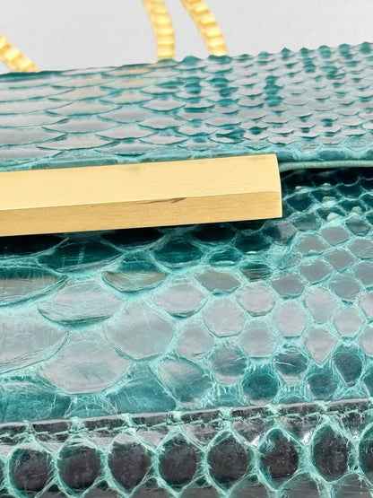 Pre - loved AMANDA NAVAI Green Embossed Handbag at Reems Closet