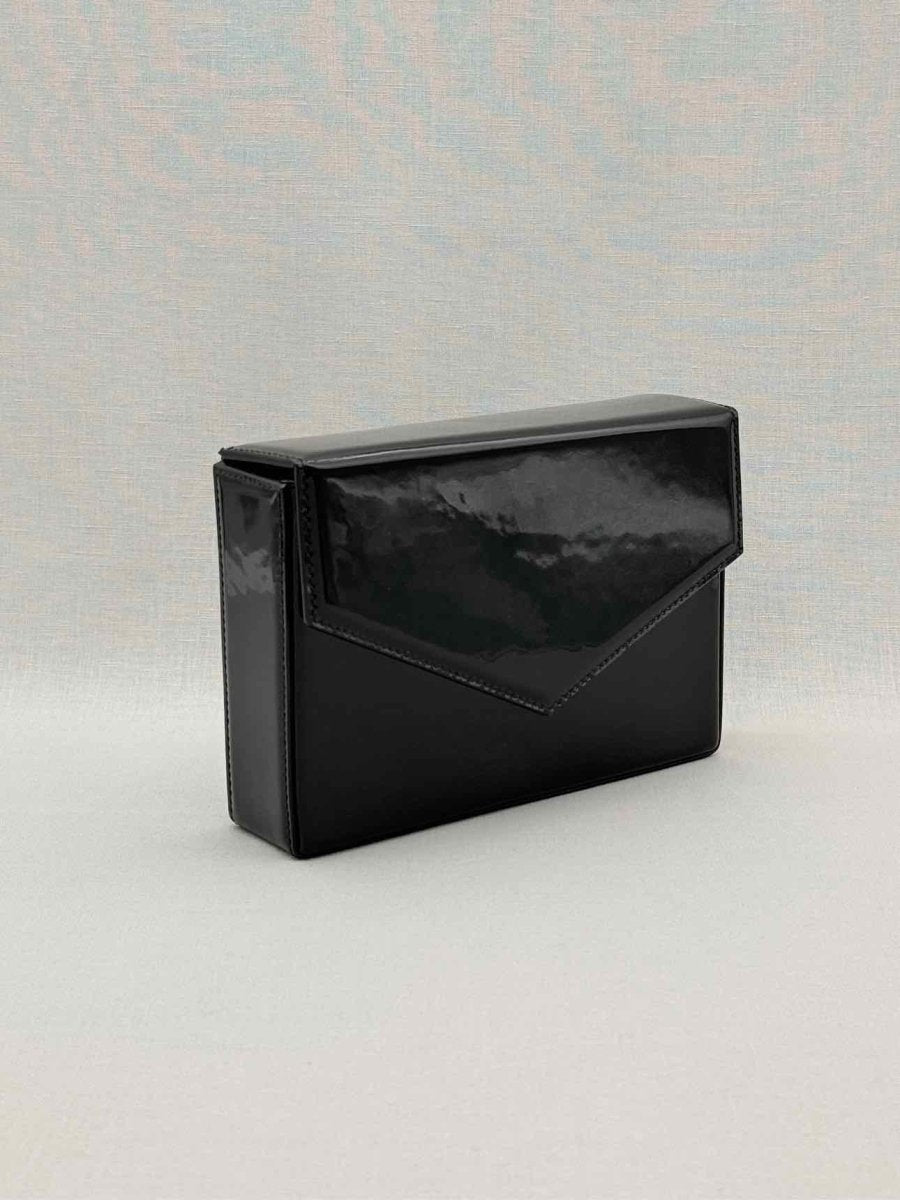 Pre-loved AMINA MUADDI Black Clutch at Reems Closet