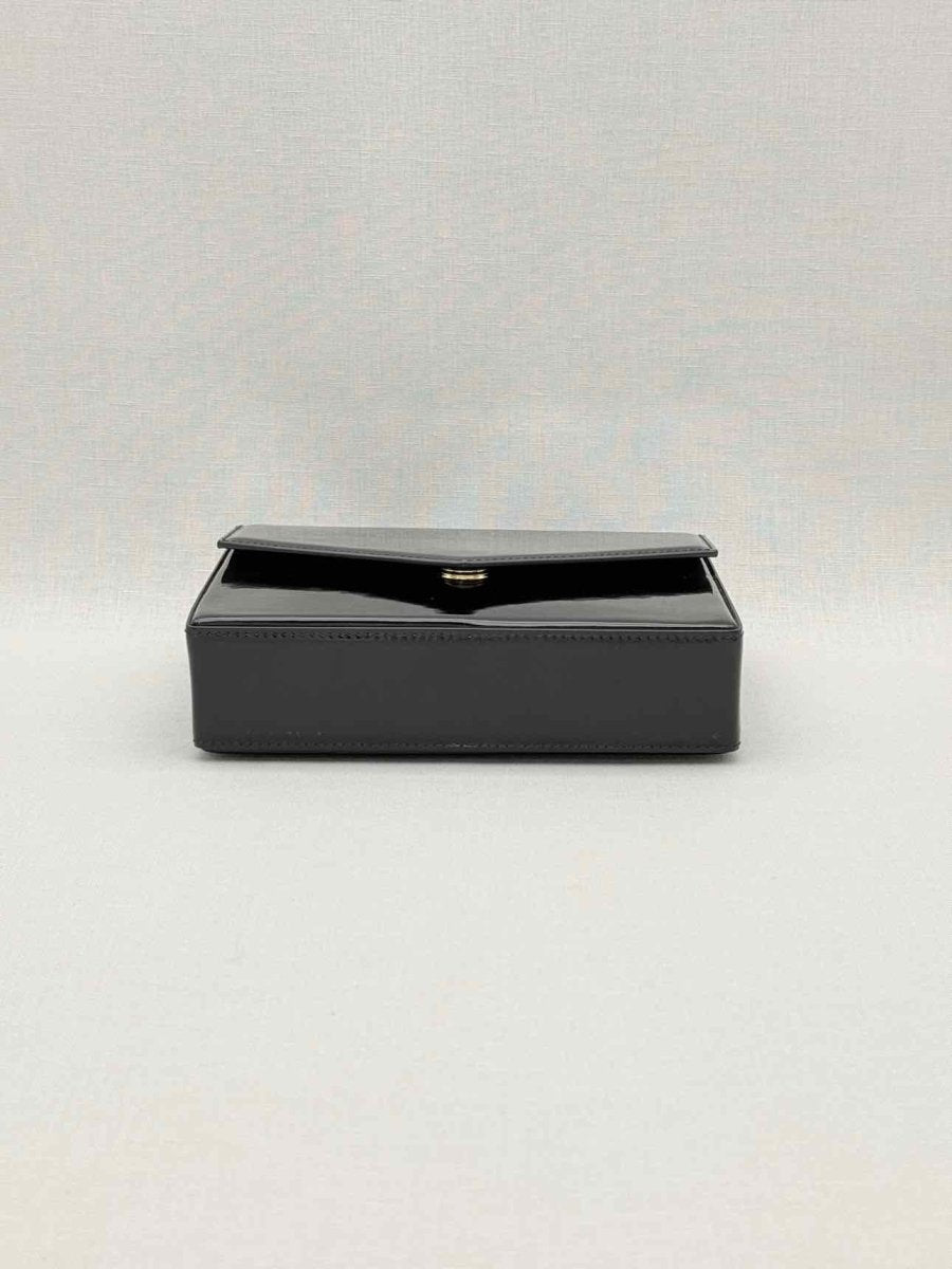 Pre-loved AMINA MUADDI Black Clutch at Reems Closet