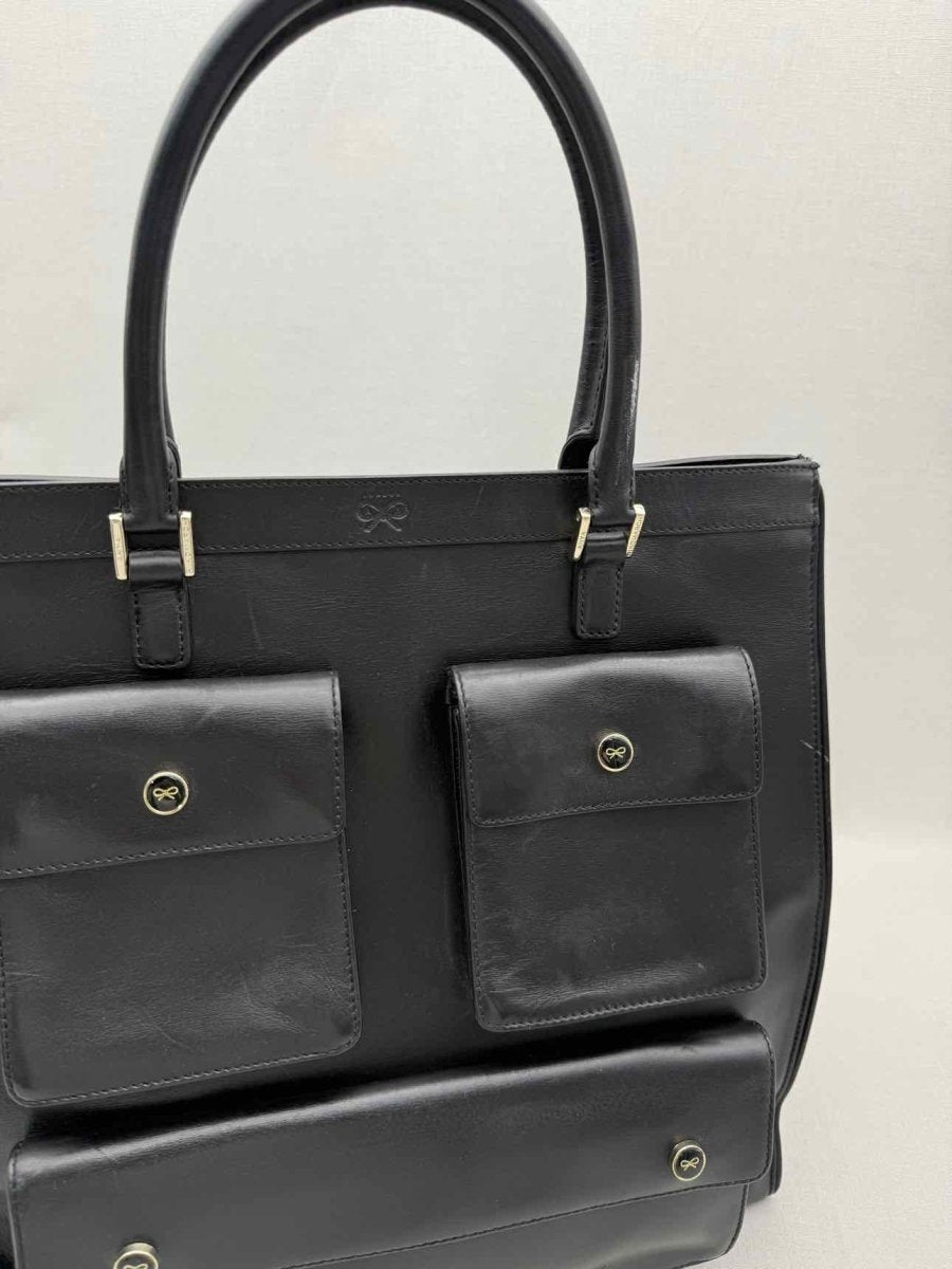 Pre-loved ANYA HINDMARCH Vintage Black Tote Bag at Reems Closet