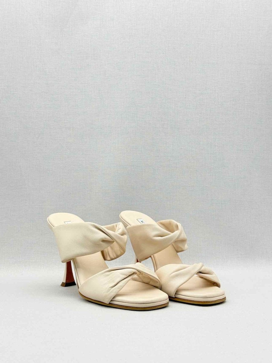 Pre-loved AQUAZZURA Twist Cream Size EU 41 Mules at Reems Closet