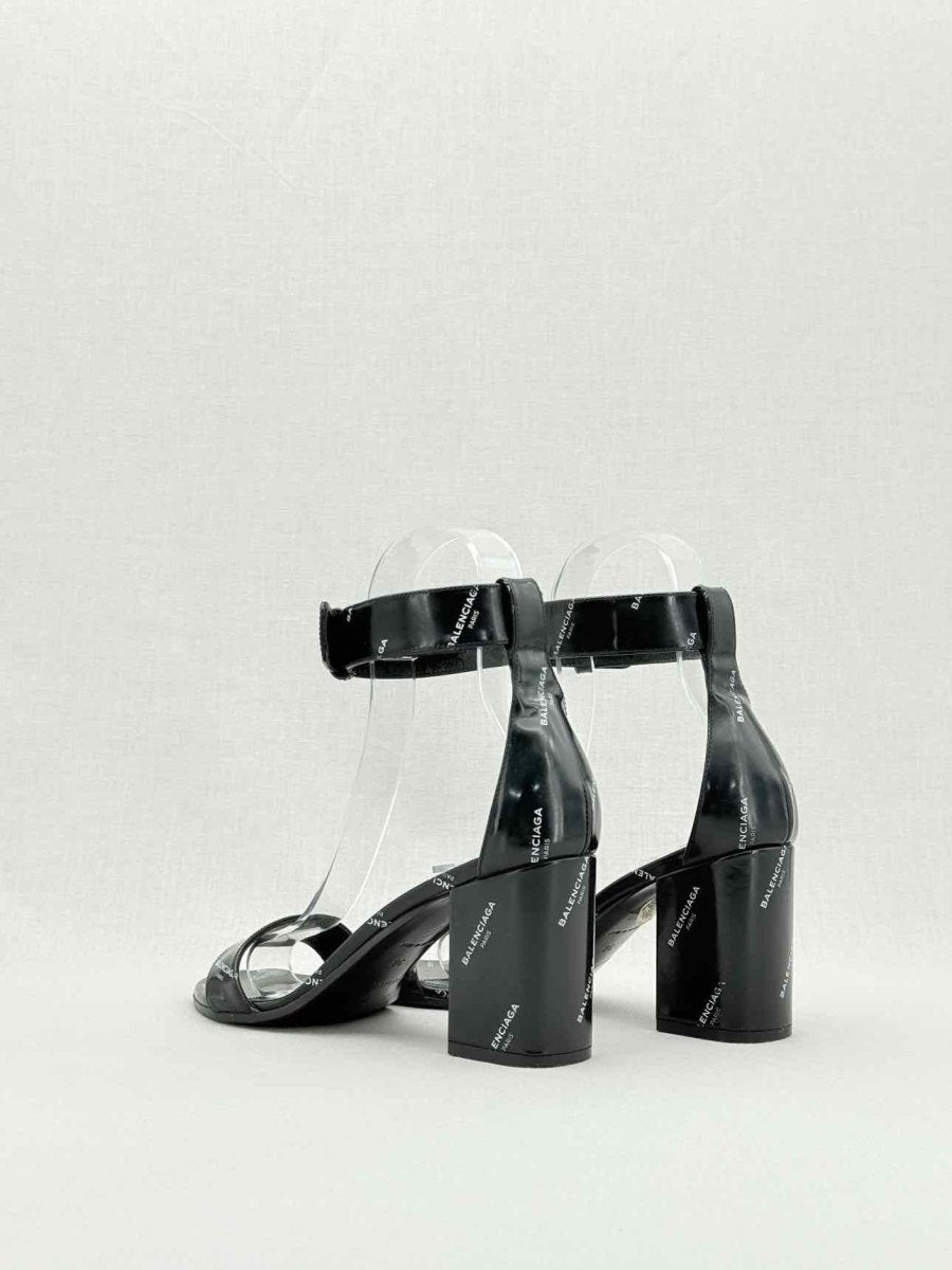 Pre - loved BALENCIAGA Black Logo Print Size EU 38 Heeled Sandals at Reems Closet