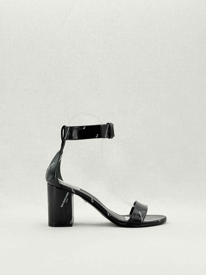 Pre - loved BALENCIAGA Black Logo Print Size EU 38 Heeled Sandals at Reems Closet