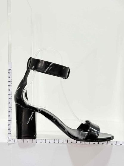Pre - loved BALENCIAGA Black Logo Print Size EU 38 Heeled Sandals at Reems Closet