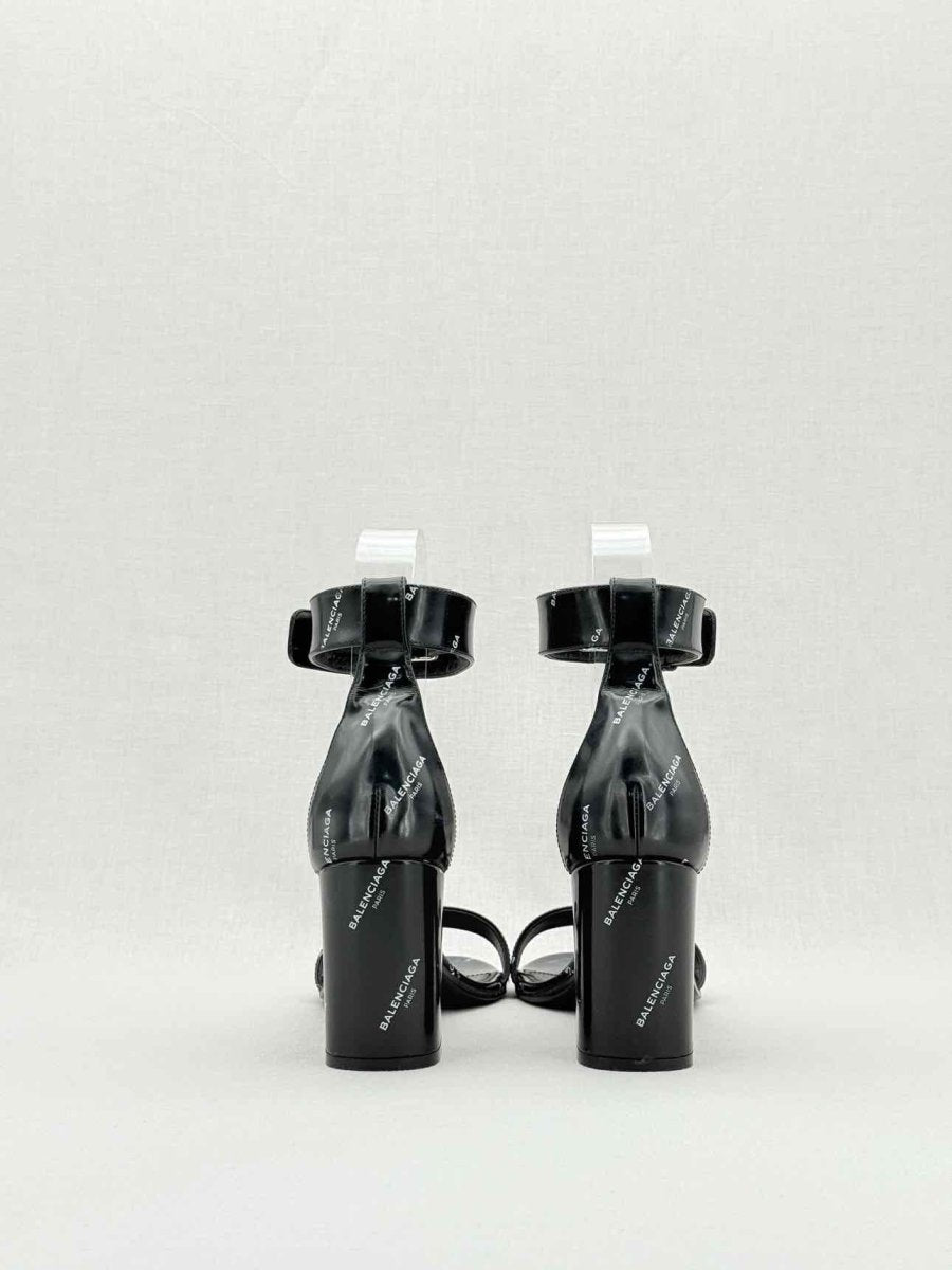 Pre - loved BALENCIAGA Black Logo Print Size EU 38 Heeled Sandals at Reems Closet