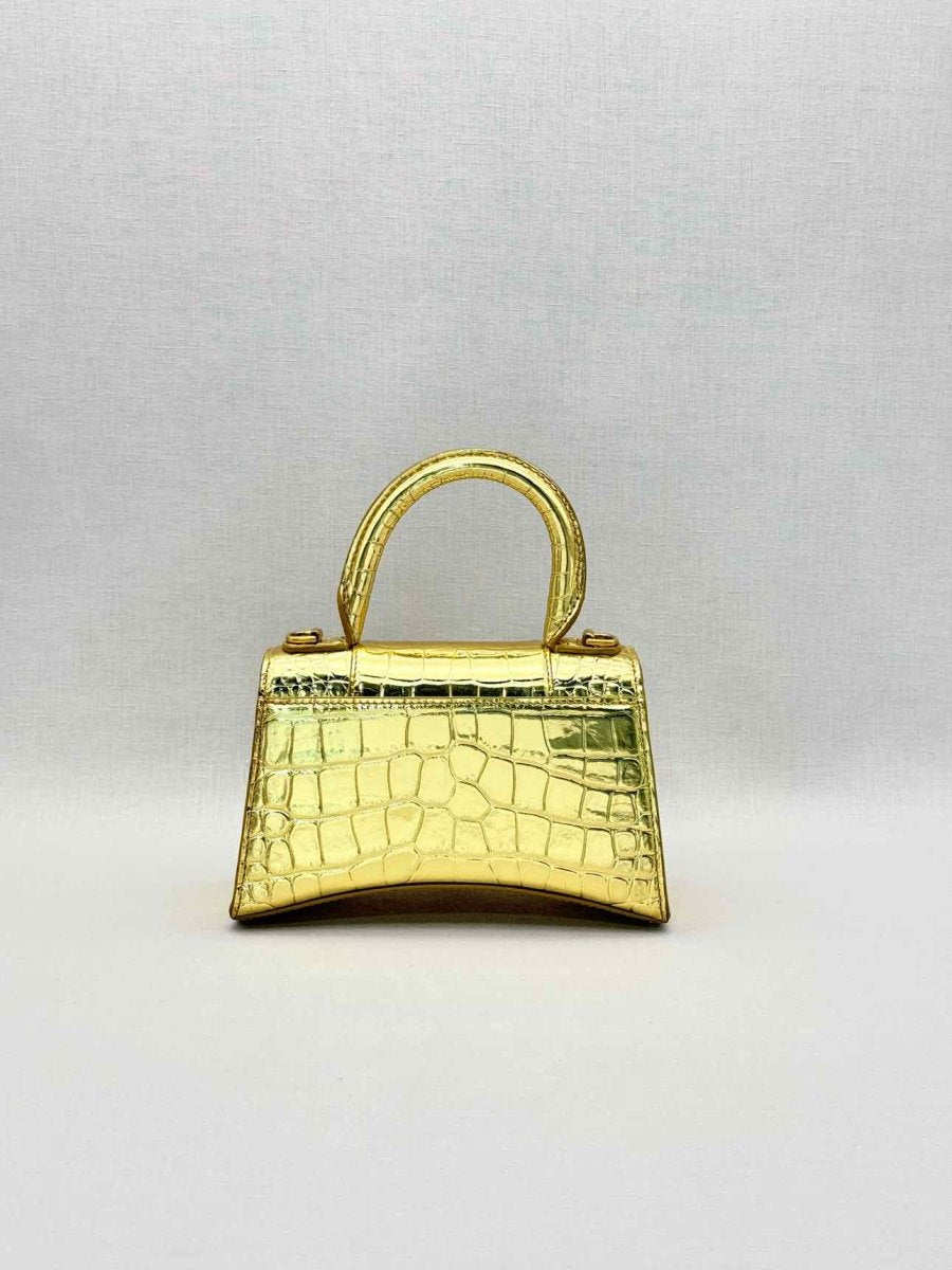 Pre-loved BALENCIAGA Hourglass Metallic Gold Top Handle at Reems Closet