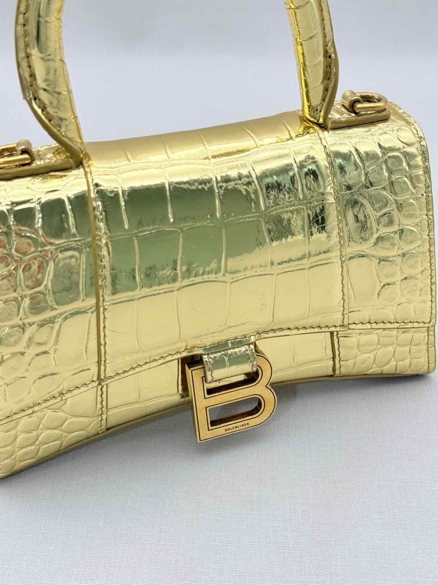 Pre-loved BALENCIAGA Hourglass Metallic Gold Top Handle at Reems Closet