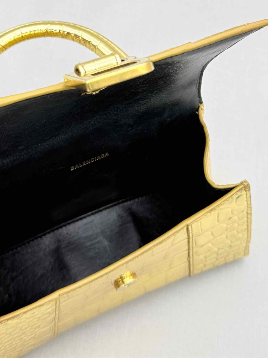 Pre-loved BALENCIAGA Hourglass Metallic Gold Top Handle at Reems Closet