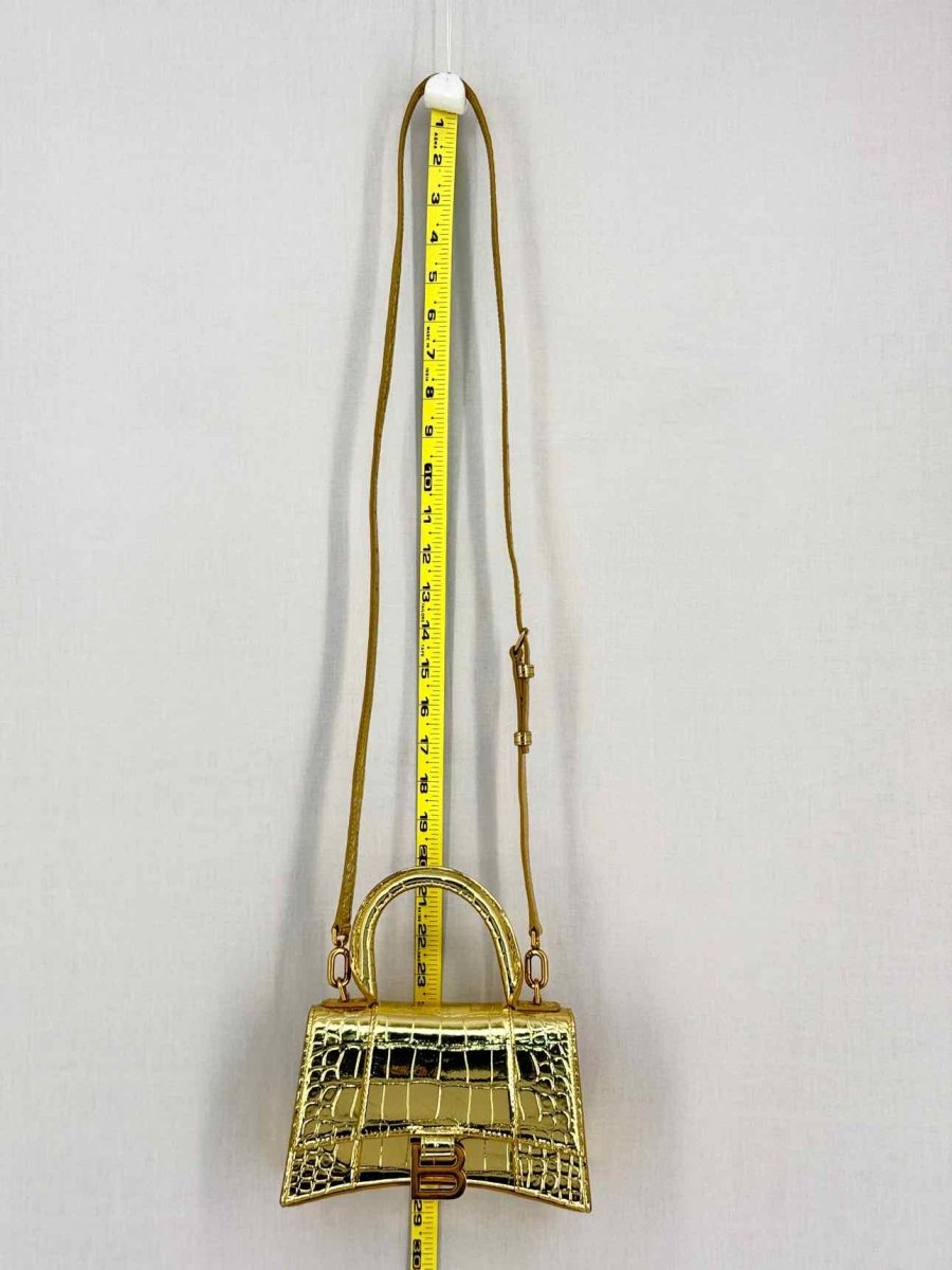 Pre-loved BALENCIAGA Hourglass Metallic Gold Top Handle at Reems Closet