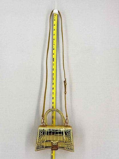 Pre-loved BALENCIAGA Hourglass Metallic Gold Top Handle at Reems Closet