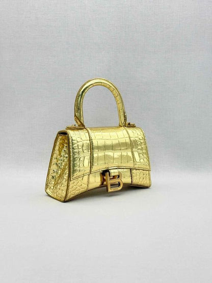 Pre-loved BALENCIAGA Hourglass Metallic Gold Top Handle at Reems Closet