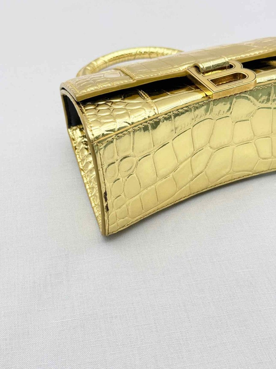 Pre-loved BALENCIAGA Hourglass Metallic Gold Top Handle at Reems Closet