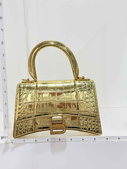 Pre-loved BALENCIAGA Hourglass Metallic Gold Top Handle at Reems Closet