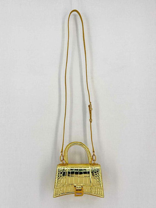 Pre-loved BALENCIAGA Hourglass Metallic Gold Top Handle at Reems Closet
