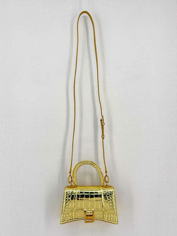 Pre-loved BALENCIAGA Hourglass Metallic Gold Top Handle at Reems Closet