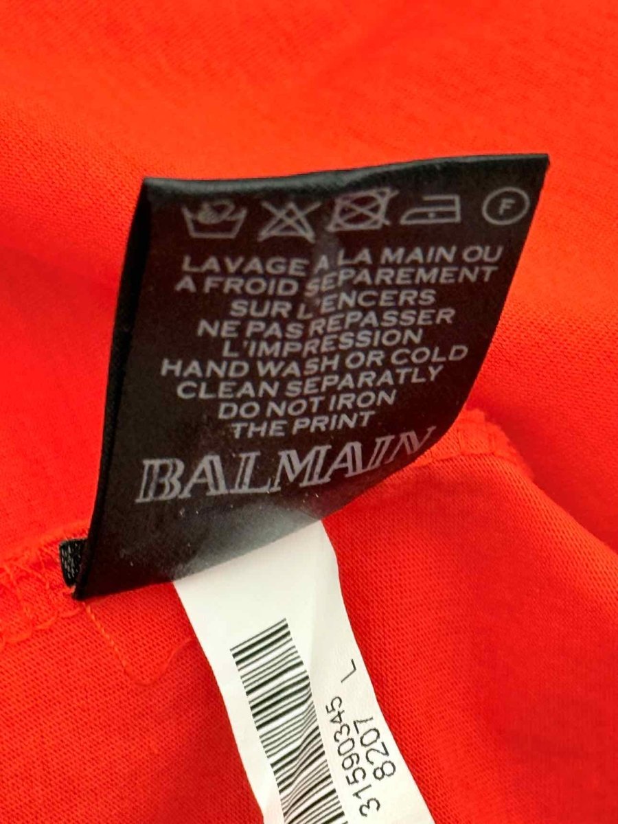 Pre - loved BALMAIN Orange Logo Print Size Large Top at Reems Closet