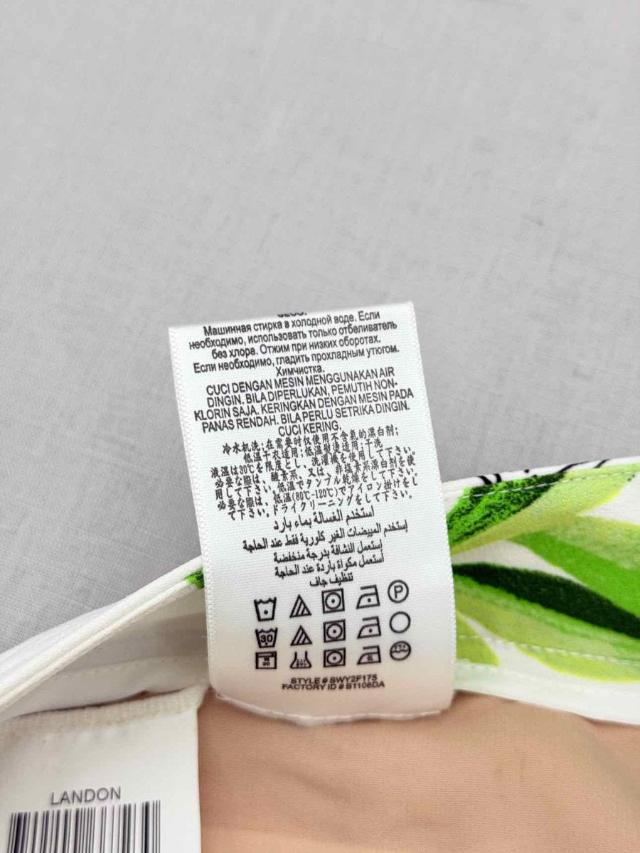 Pre - loved BCBG White Multicolor Floral Size Medium Pants at Reems Closet