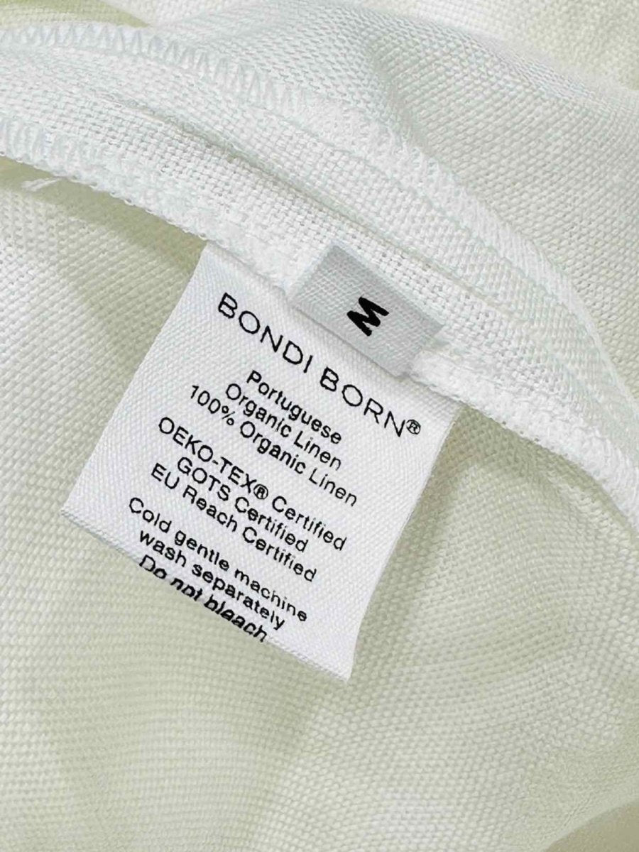 Pre - loved BONDI BORN Strapless White Top at Reems Closet