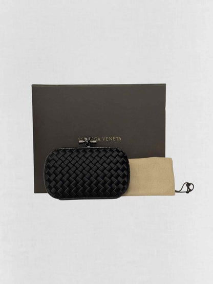 Pre - loved BOTTEGA VENETA Knot Black Intrecciato Clutch at Reems Closet