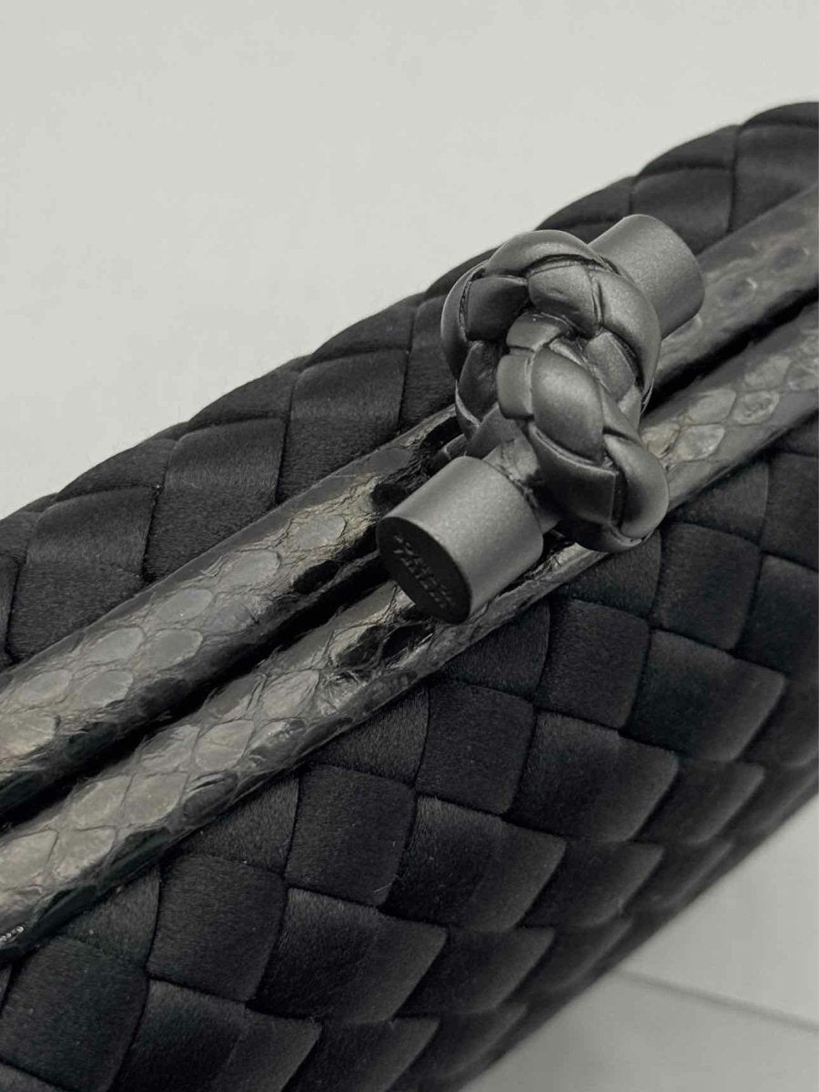 Pre - loved BOTTEGA VENETA Knot Black Intrecciato Clutch at Reems Closet