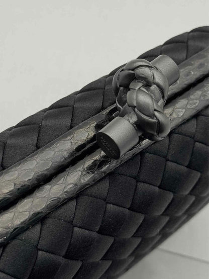 Pre - loved BOTTEGA VENETA Knot Black Intrecciato Clutch at Reems Closet